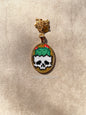Collar ovalado con diseño de calavera y cactus